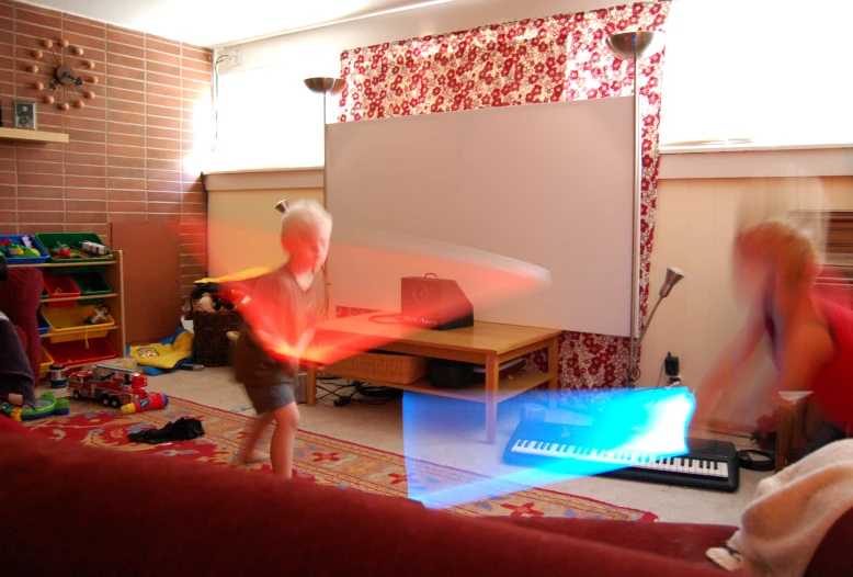 two children are playing in a play room