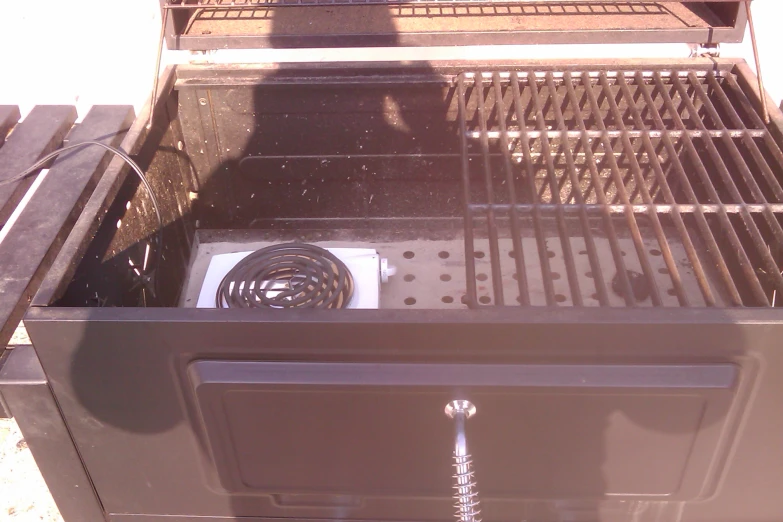 a grill with ventilator is empty of the grill