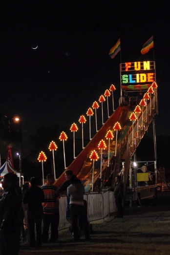 a ride in the park lit up at night
