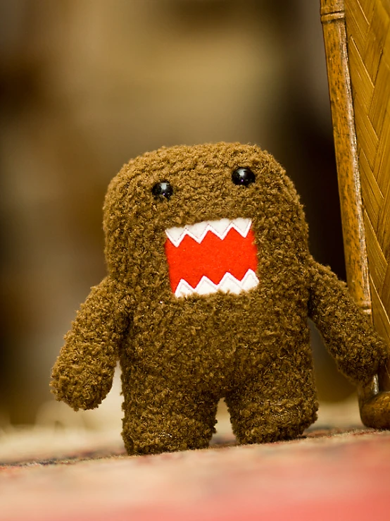 a very cute looking toy with a big tooth