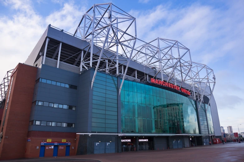 a stadium in an empty field with blue sky