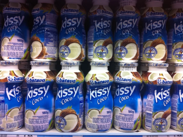 kirsy and coconut juice stacked in a refrigerator