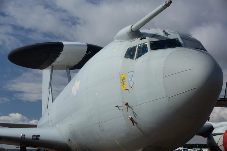 an air plane parked outside of a building