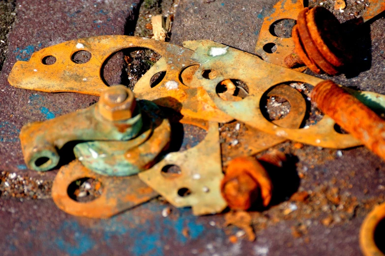 rusty wheels, rusted steel, and holes that may be broken or repaired