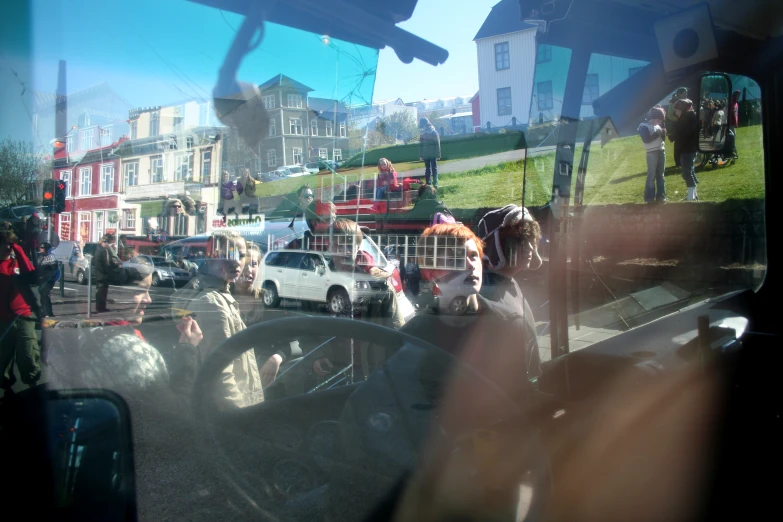 an image of several vehicles seen through the window