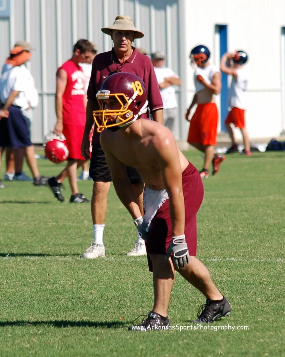 a football player getting ready to kick the ball