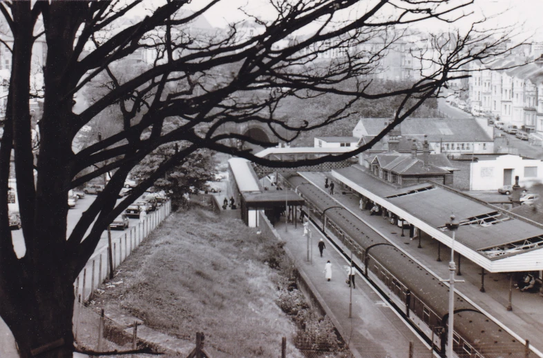 old black and white pograph of trains on train tracks