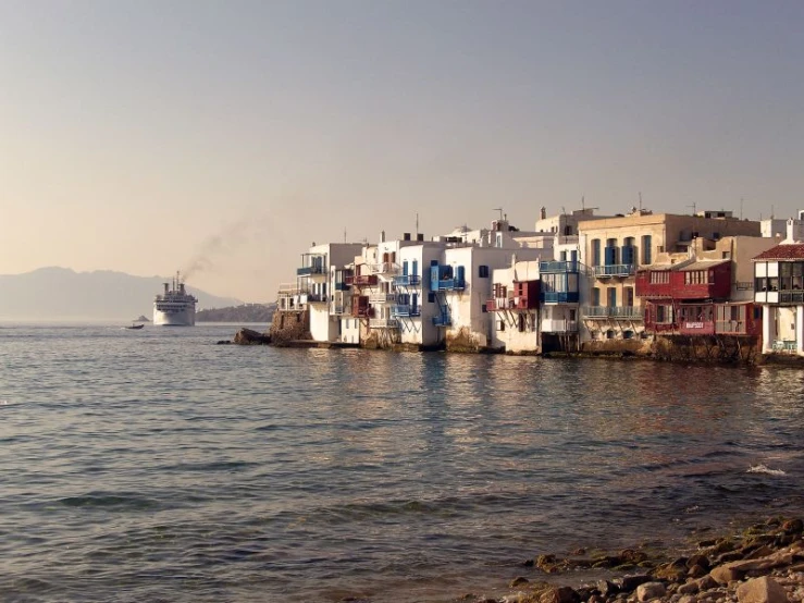 a small village with several boats in the water