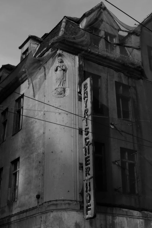 an old, dilapidated building in black and white