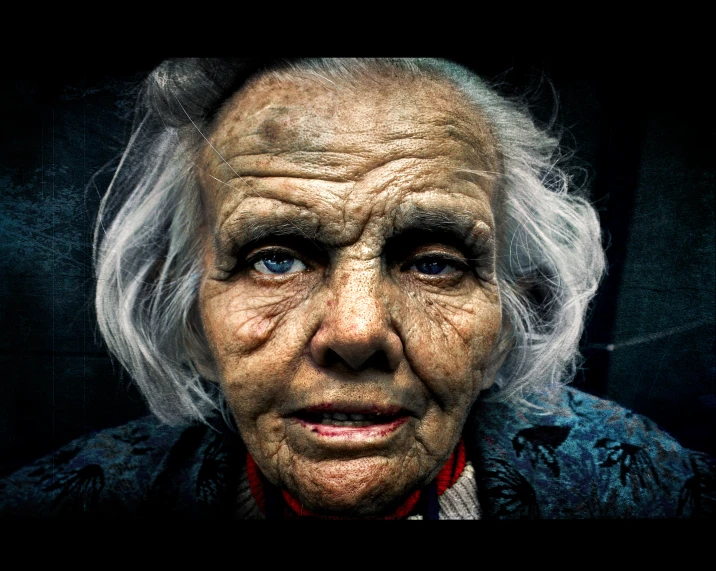 a old woman looking into the camera with wrinkles