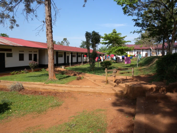 a row of small cottages with children's play grounds