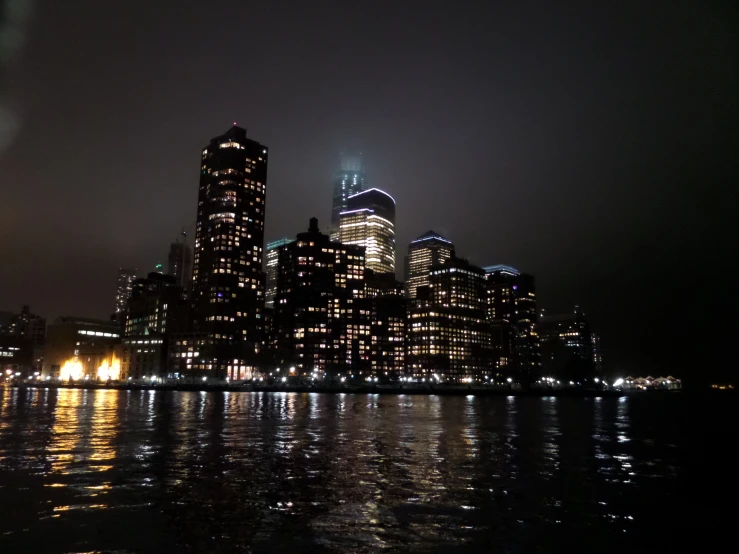 an image of a city at night with its lights on