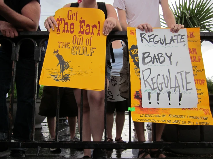 there are a lot of protesters outside holding signs