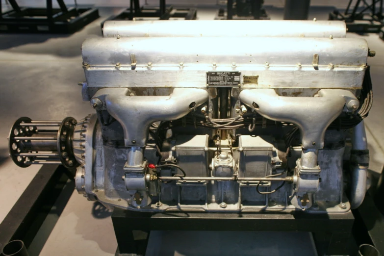 a white engine on display in a museum