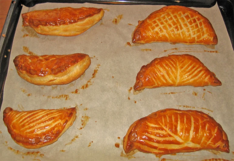 baked meat pieces in tray ready to be baked