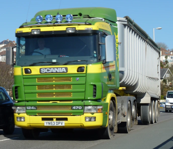 a truck that is parked near a street