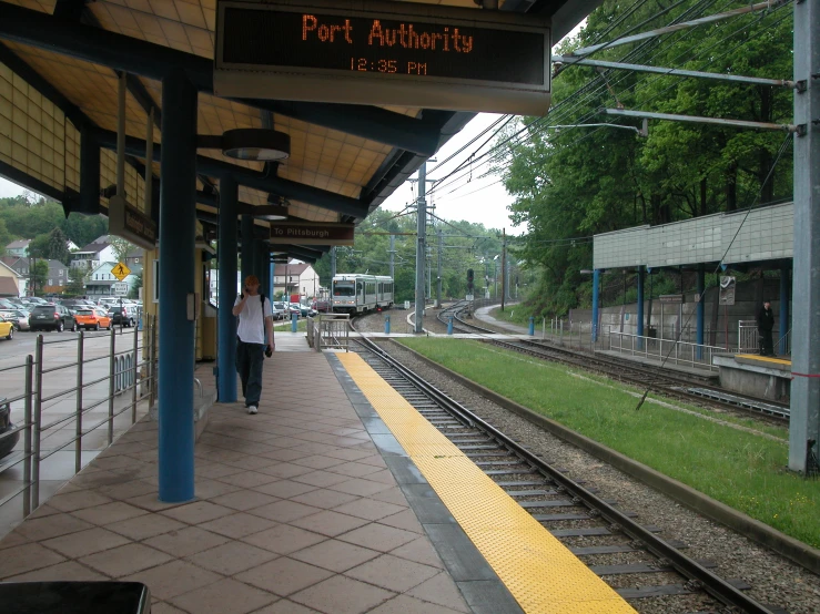 a train station with several tracks next to it