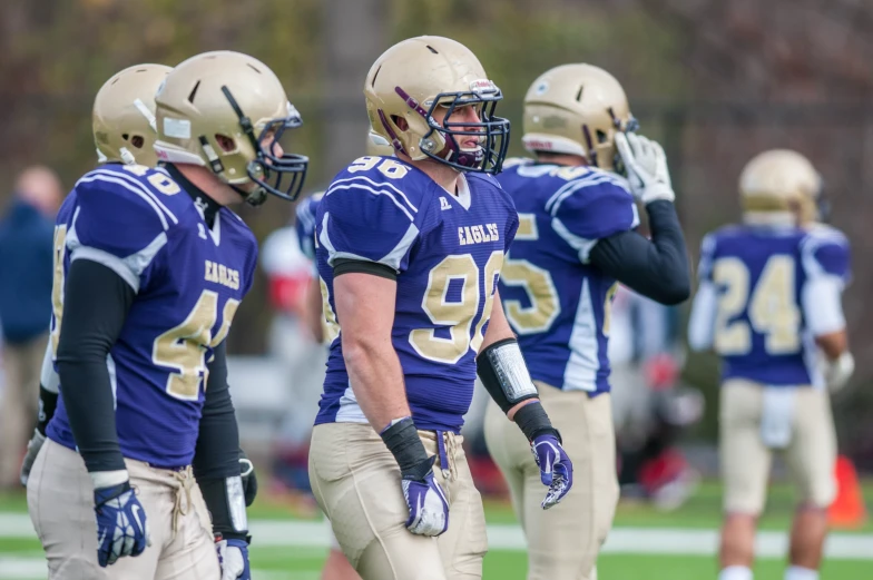 football players are dressed in their uniforms