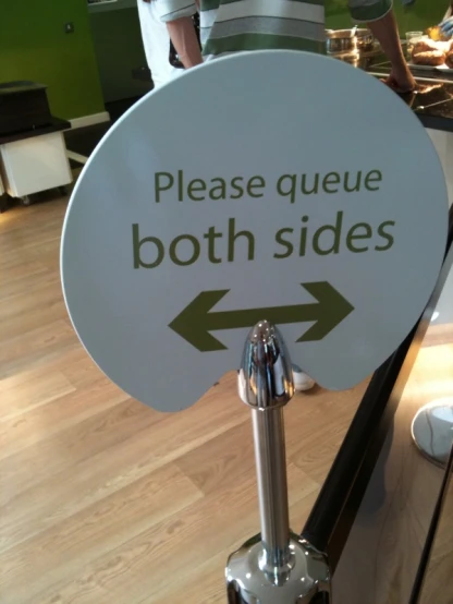 this is a sign on the counter indicating both sides