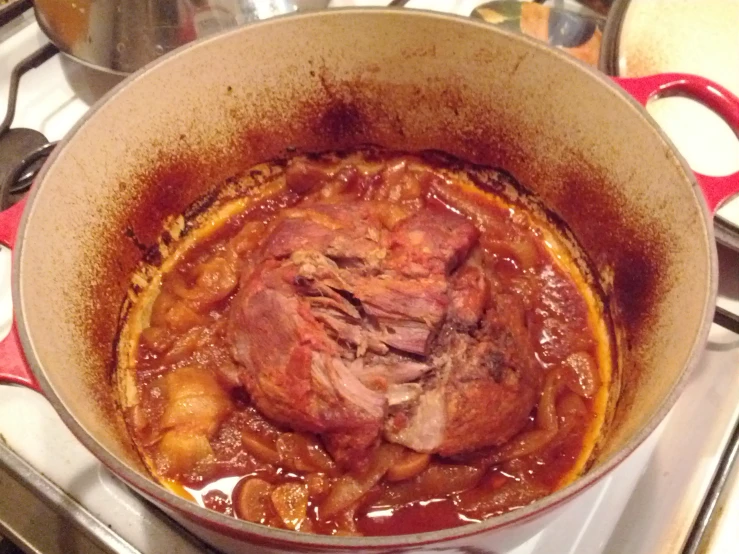 a pot full of food on top of a stove