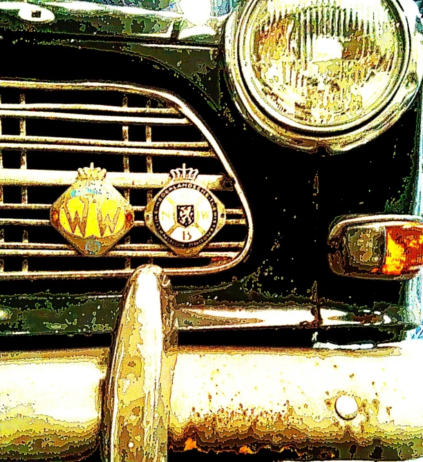 an old fashioned car with the front grille off
