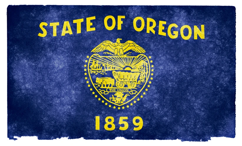 a state of oregon flag with the motto