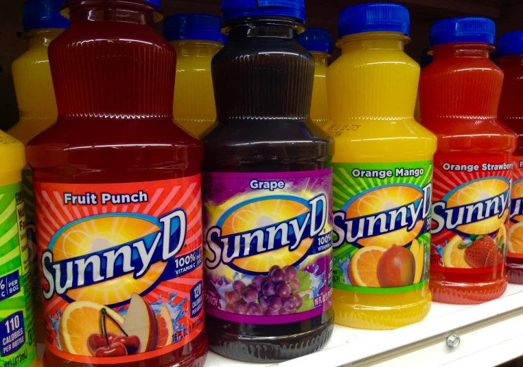 bottles of sunny d juice and fruit punch are on display