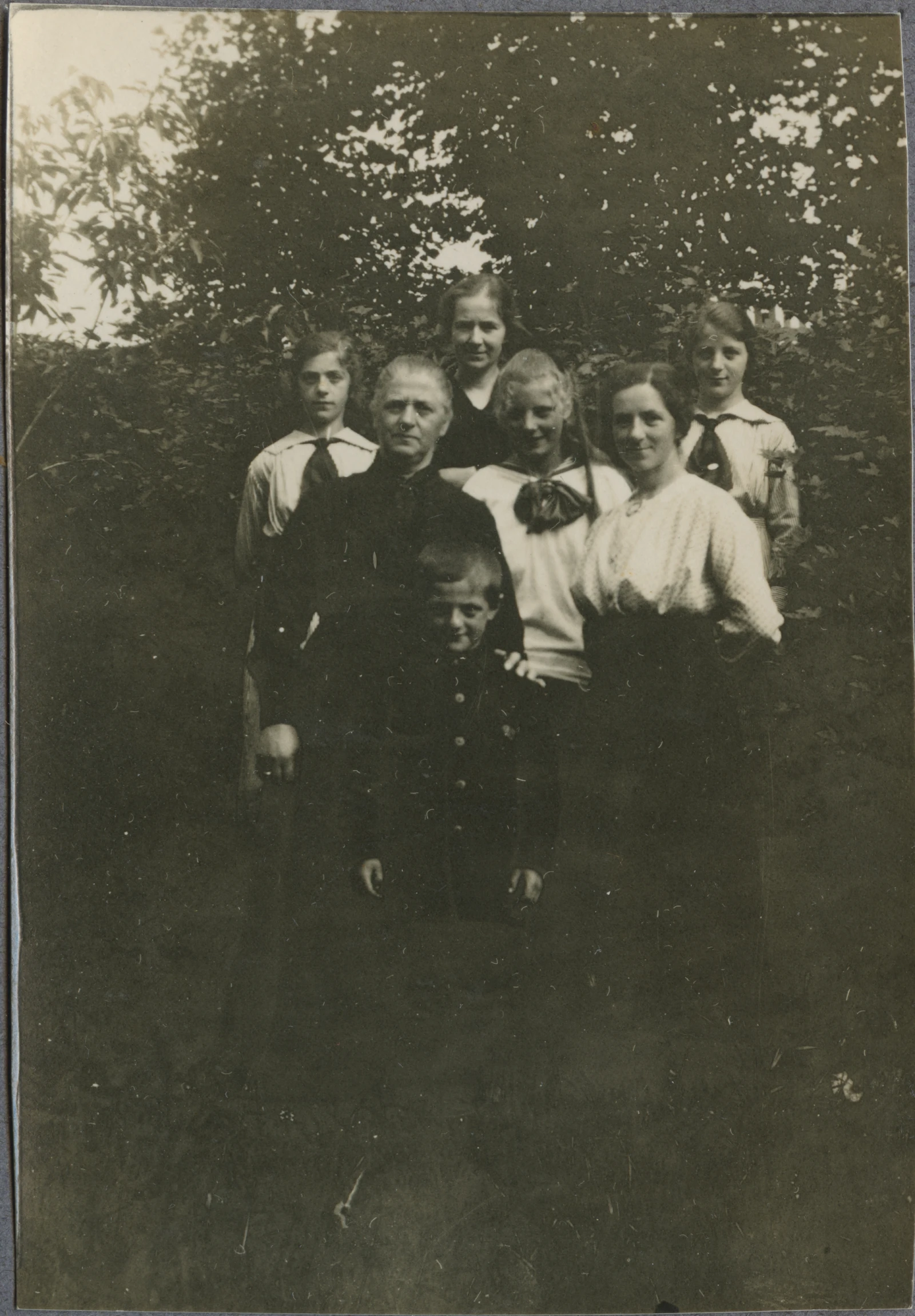 old black and white pograph of a young family