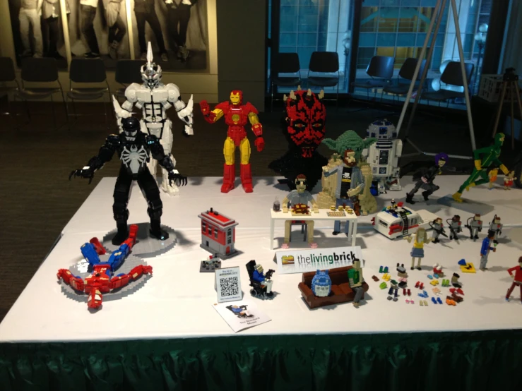 lego toy figures on display at event in large building