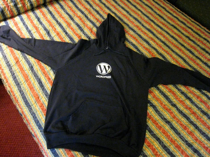 the hoodie is on the bed, and it is very nice