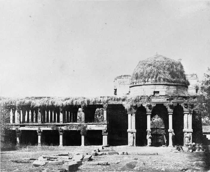 old pograph of an ancient building with pillars