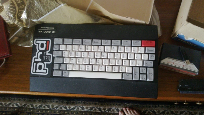 a small old style computer with a new keyboard