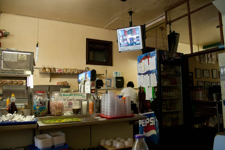 the counter in a diner that has drinks on it