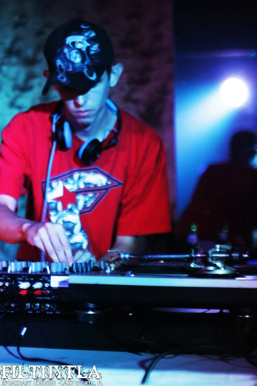 a person is playing the music on a dj set