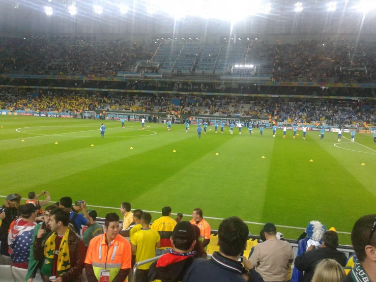 a crowd of people at a soccer game