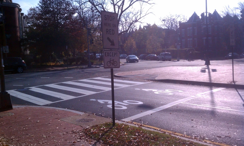 a street corner with no parking sign on the corner