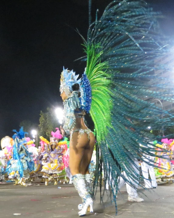 two woman are dressed up with their costumes and headdress