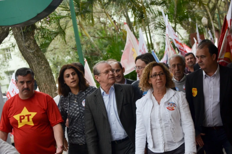 a group of people standing next to each other