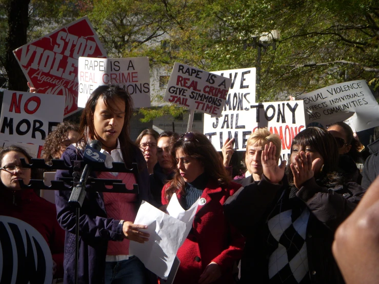 a person at a protest on cell phones