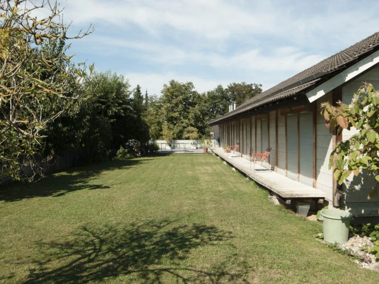 a house with porch and outdoor seating