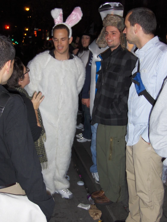 a group of people dressed in bunny suits