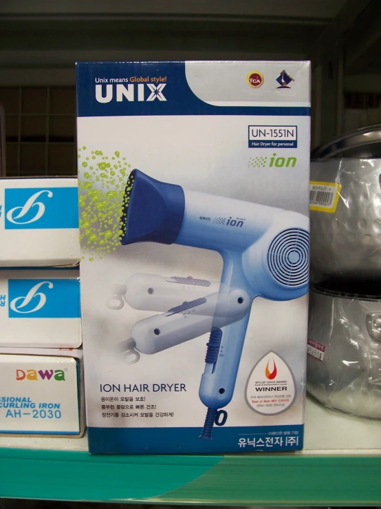 a box on a store shelf showing a blow dryer