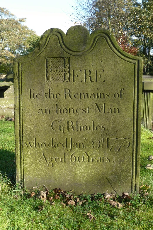 the monument of the war veteran of ww1, that is located in the grounds of a cemetery