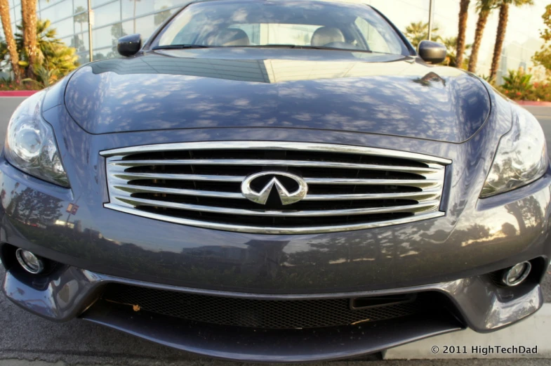 a dark colored car in a parking lot