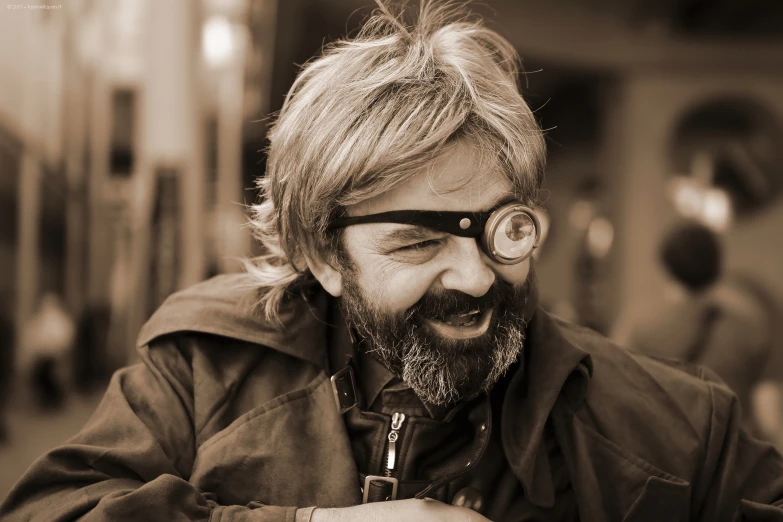 a man with his face partially obscured by the glass