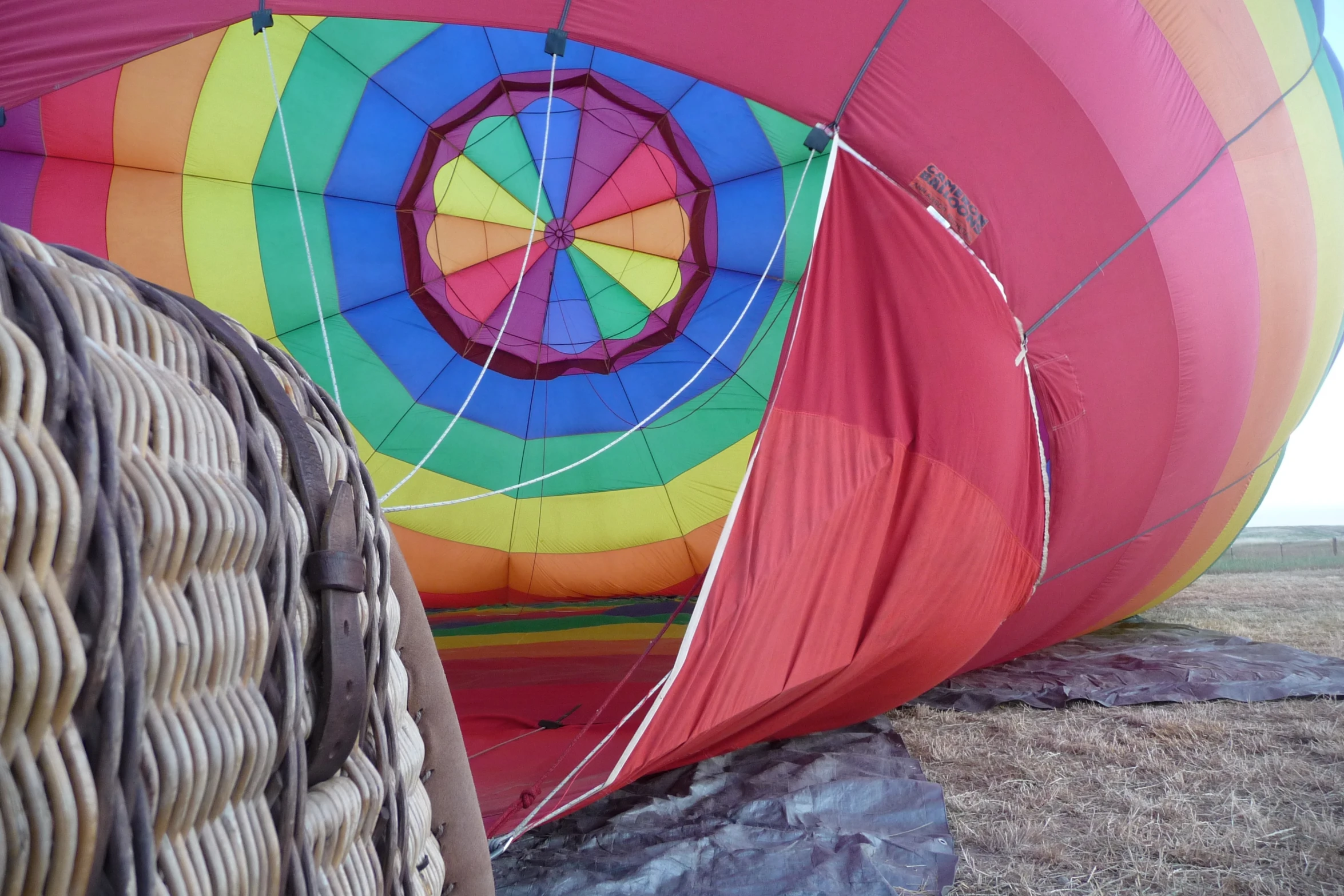 the inside of a multicolored  air balloon