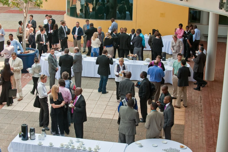 an image of a crowd at a conference with many people gathered