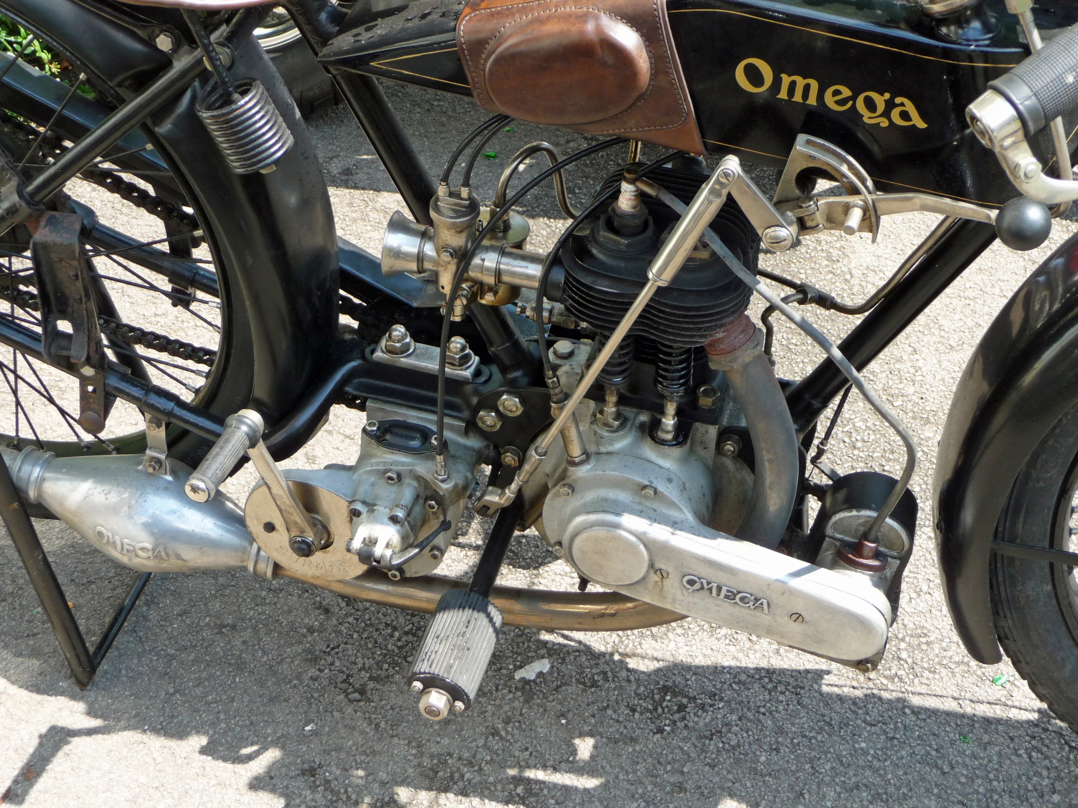 a motorcycle with a front and rear wheel on the ground