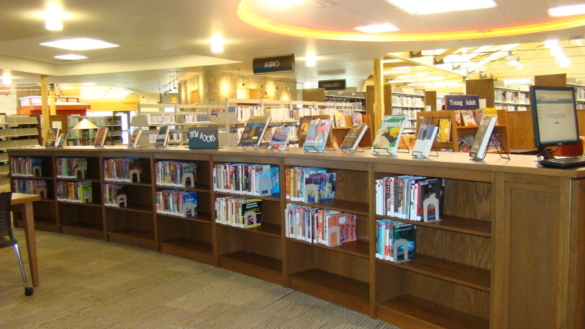 a view of a bookshop with many shelves