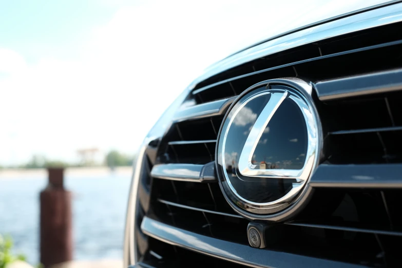 a closeup of the face and badge of a car